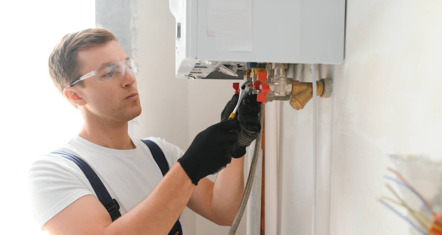 Man-repairing-water-heater